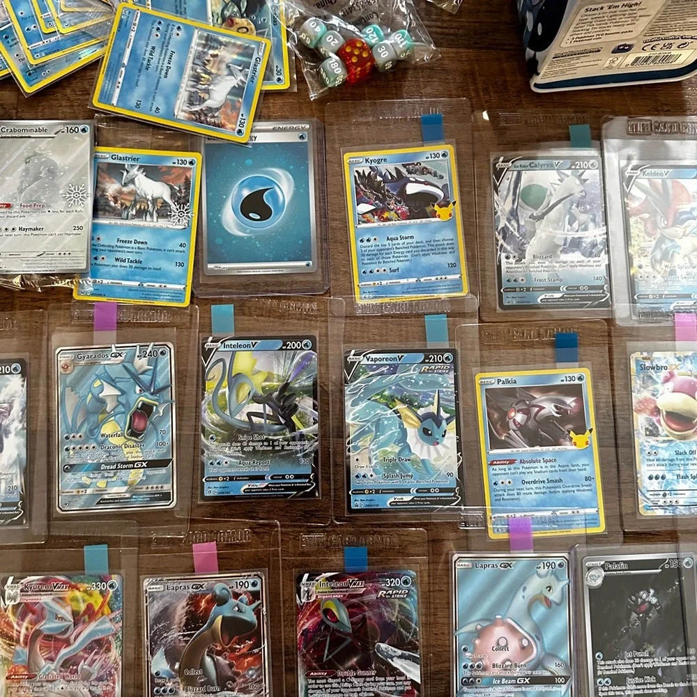 Pokemon Card Collection with Tins and Accessories 25 card Mystery Tin plus bonus
